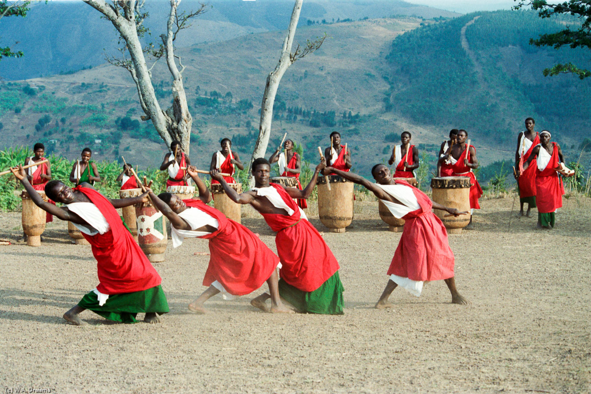 Some of them dance accompanied by the drumming of the others.
