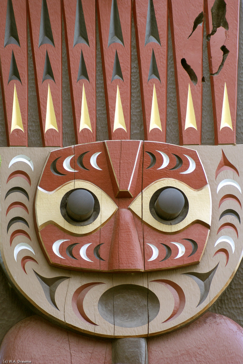 Another carved welcome gateway by Coast Salish artist Susan Point. They are carved of red cedar and constructed to represent the traditional slant-roof style of Coast Salish architecture with carved welcome figures in the doorways.