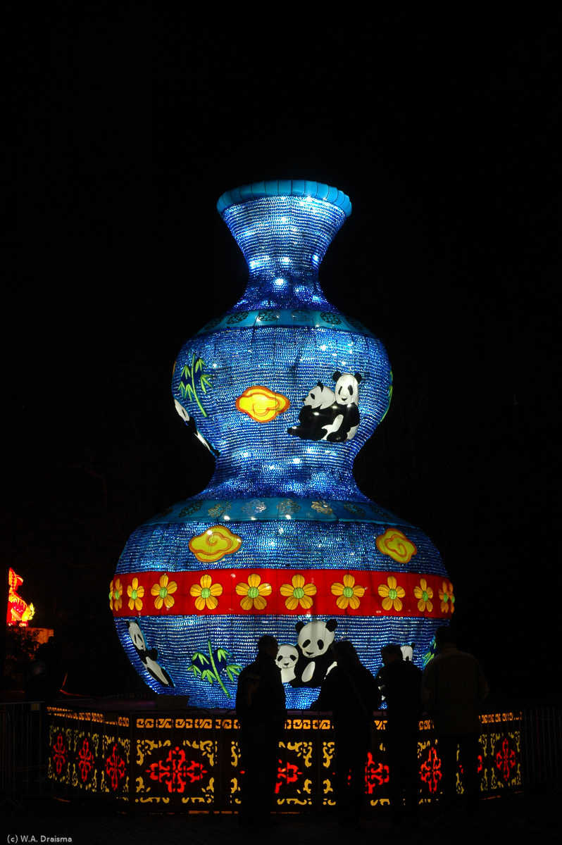 The last sculpture is a giant blue vase.