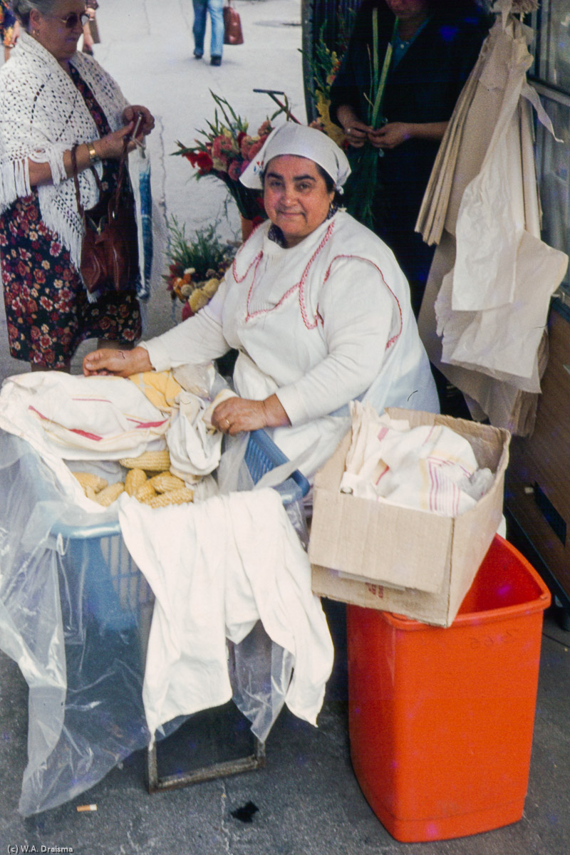 While private enterprises are not allowed under communist rule, we do see several street vendors making some money.