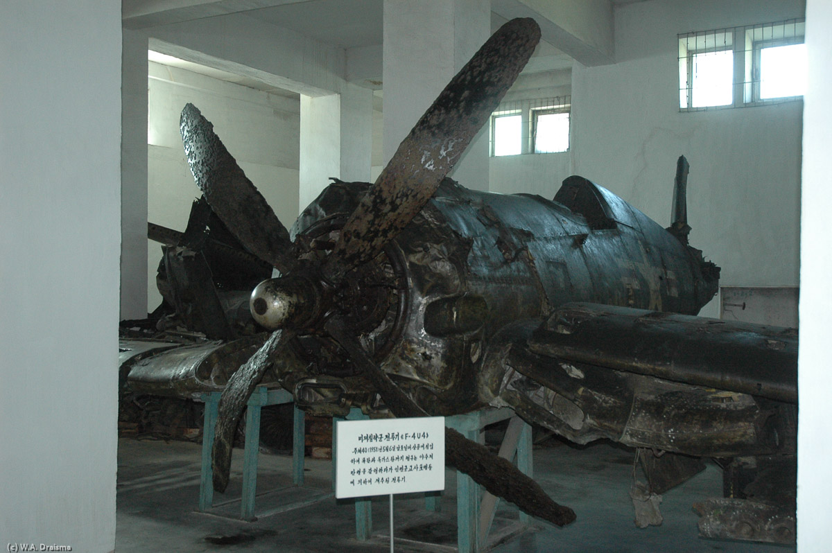 The basement of the museum contains a collection of tanks, boats and planes, both complete ones and shot down remains like this wreck of an F-4U Corsair.