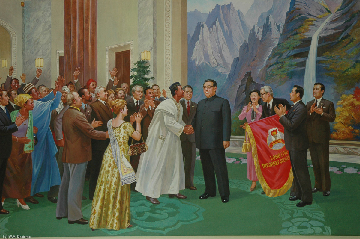 In the lobby of the March 8 Hotel we see dignitaries from all over the world congratulating Kim Il Sung with his Juche philosophy.