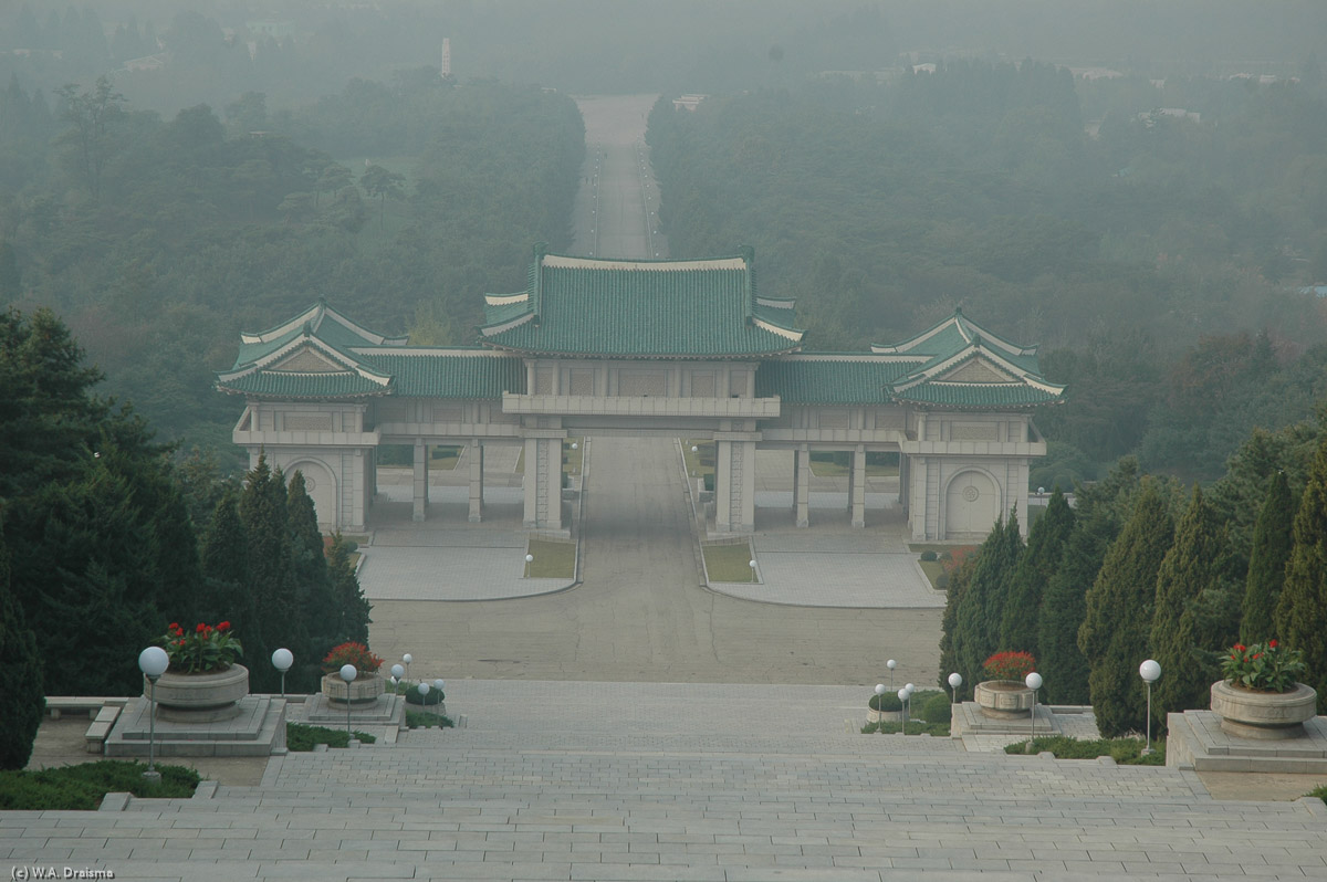 The next morning brings us to the Revolutionary Martyrs' Cemetery. From the grounds of the cemetery we look down 300 granite steps towards a large Korean-style gate.
