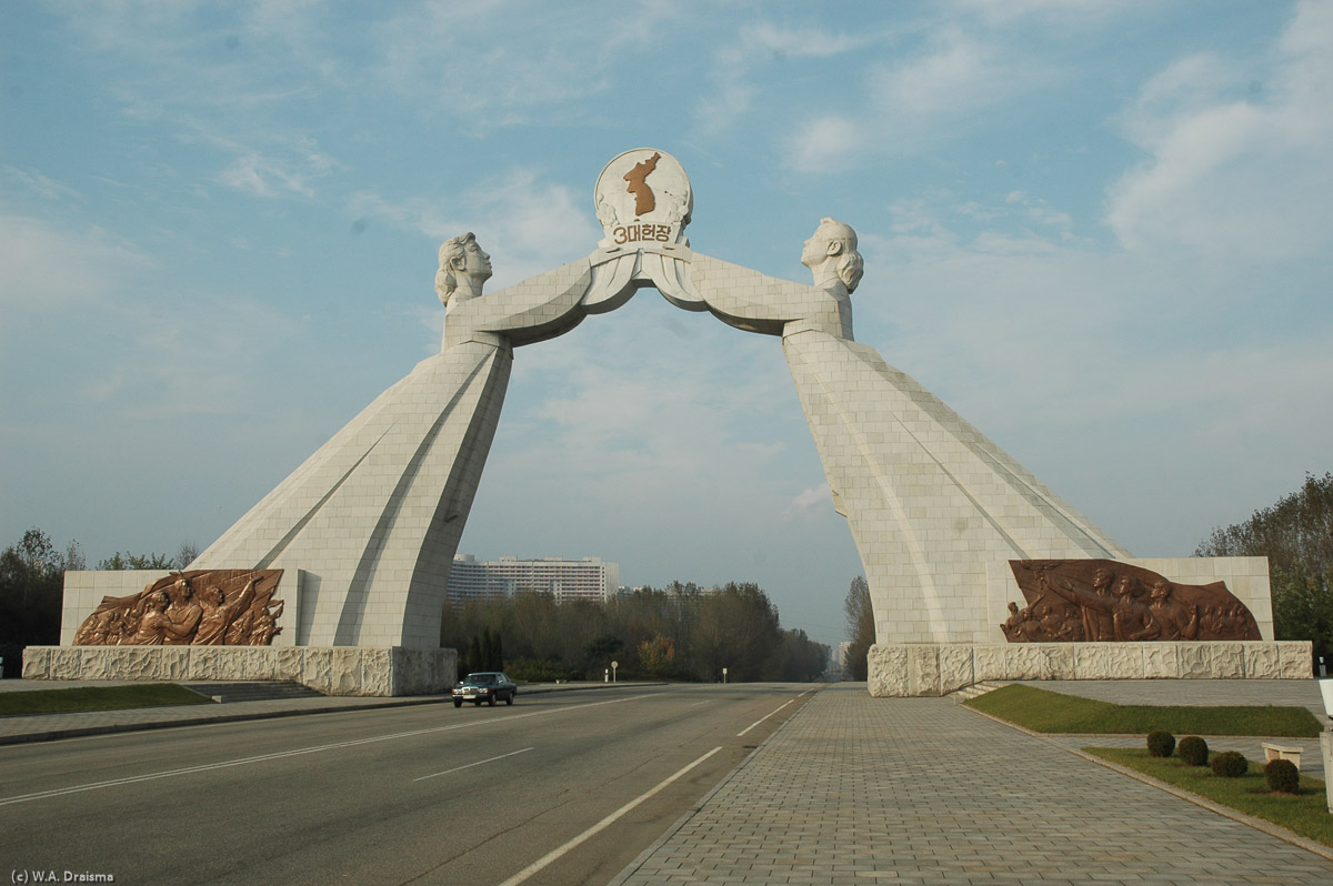 Arriving back in Pyongyang we encounter the Monument to the Three Charters of National Reunification, a 30m high granite statue of two women from both Korea's leaning together.