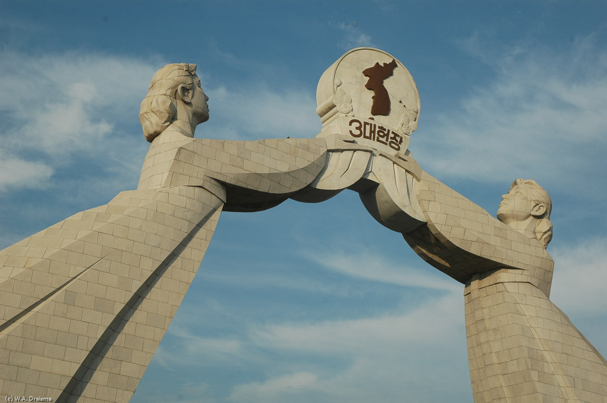 The two women in traditional dress are holding the symbol of the charter. Unveiled in 2001 the monument is also symbolically situated on the Pyongyang - Seoul highway.