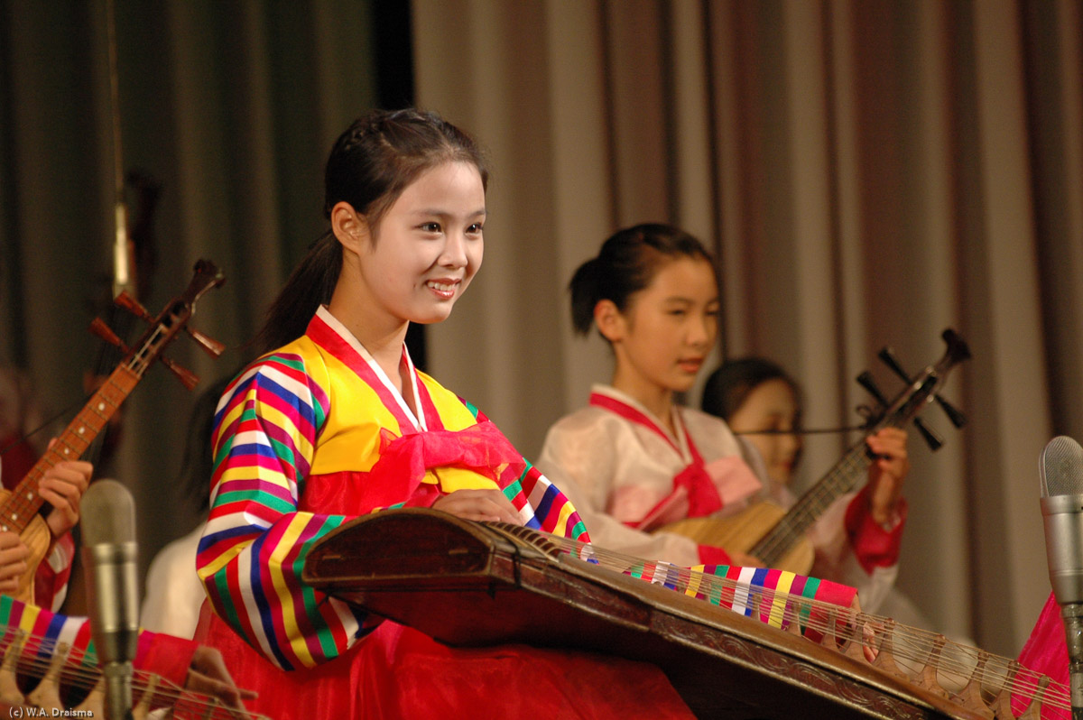 This time the instruments are played by beautifully smiling girls instead of a slightly arrogant looking male singer.