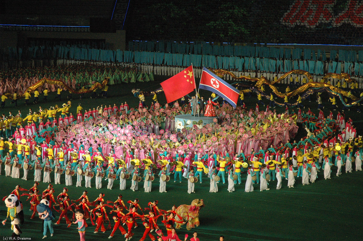 A new element in the Arirang Mass Games is a scene dedicated to the friendship with North Korea's northern neighbor China. Dragons, panda bears amidst traditional Korean people.