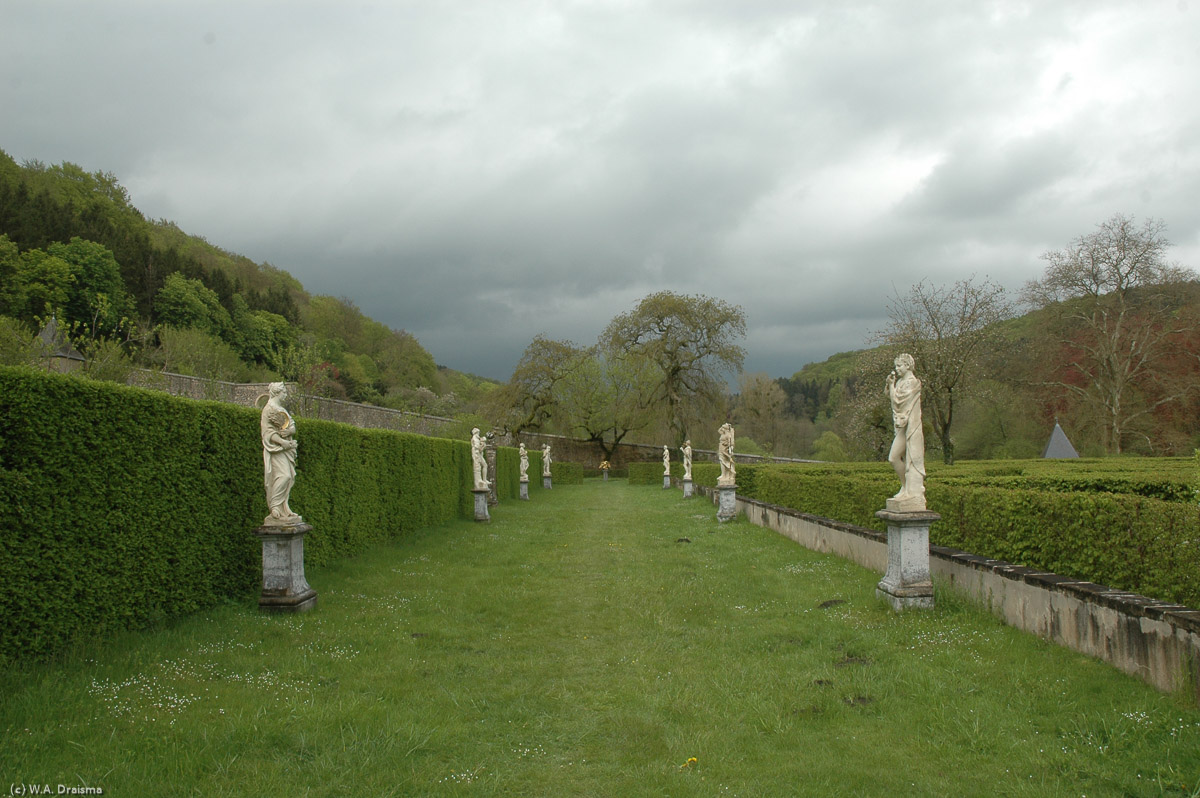 The statues form a lane that stretches across the entire width of the gardens.