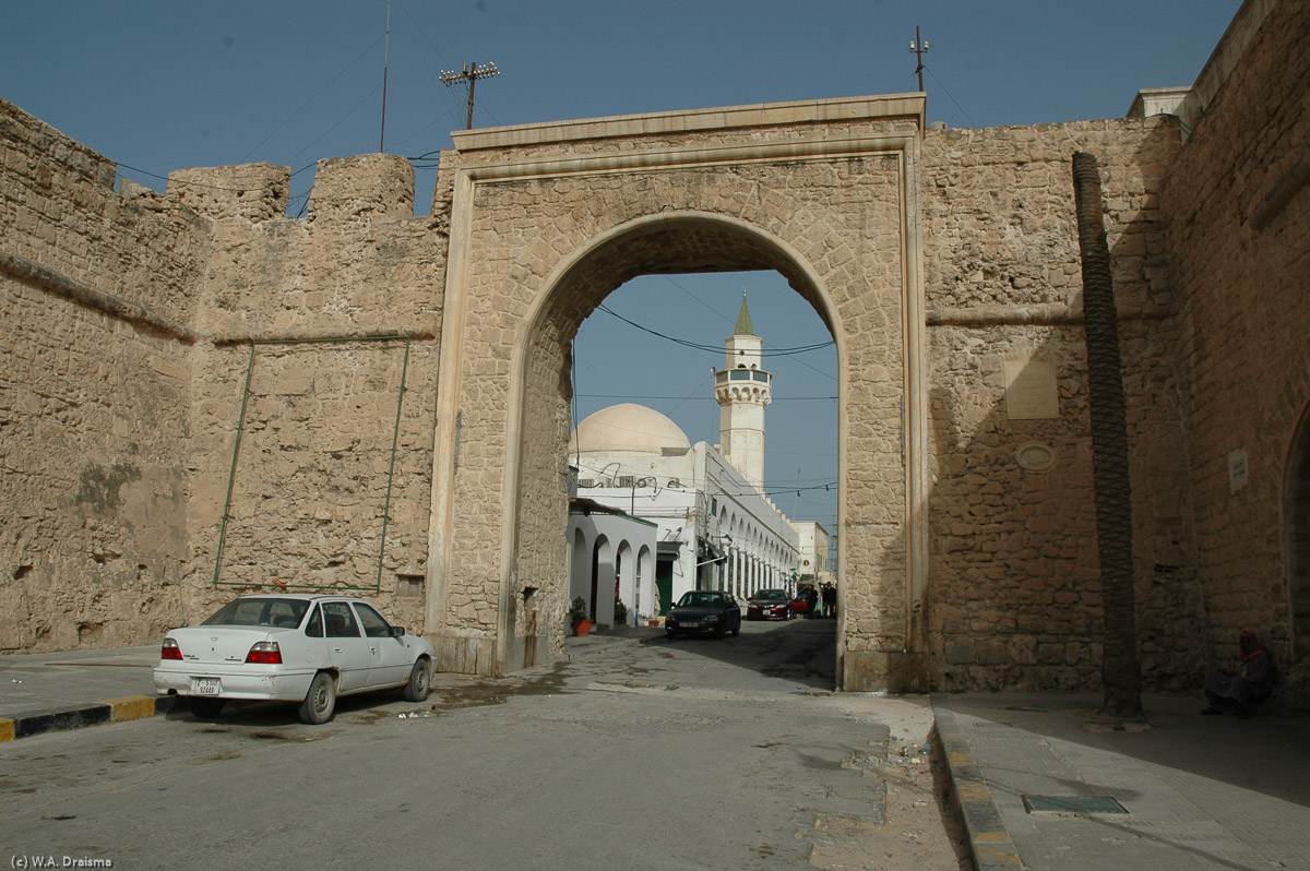 The stone archway leading into Souq al-Mushir nicely frames the Ottoman Clocktower. This is one of the main gates to the old city. Through the souq merchants and visitors entered Tripoli's medina. About 3500 people still live in the medina and about 65,000 work inside the fortified walls dating, partly, from 4th century AD.