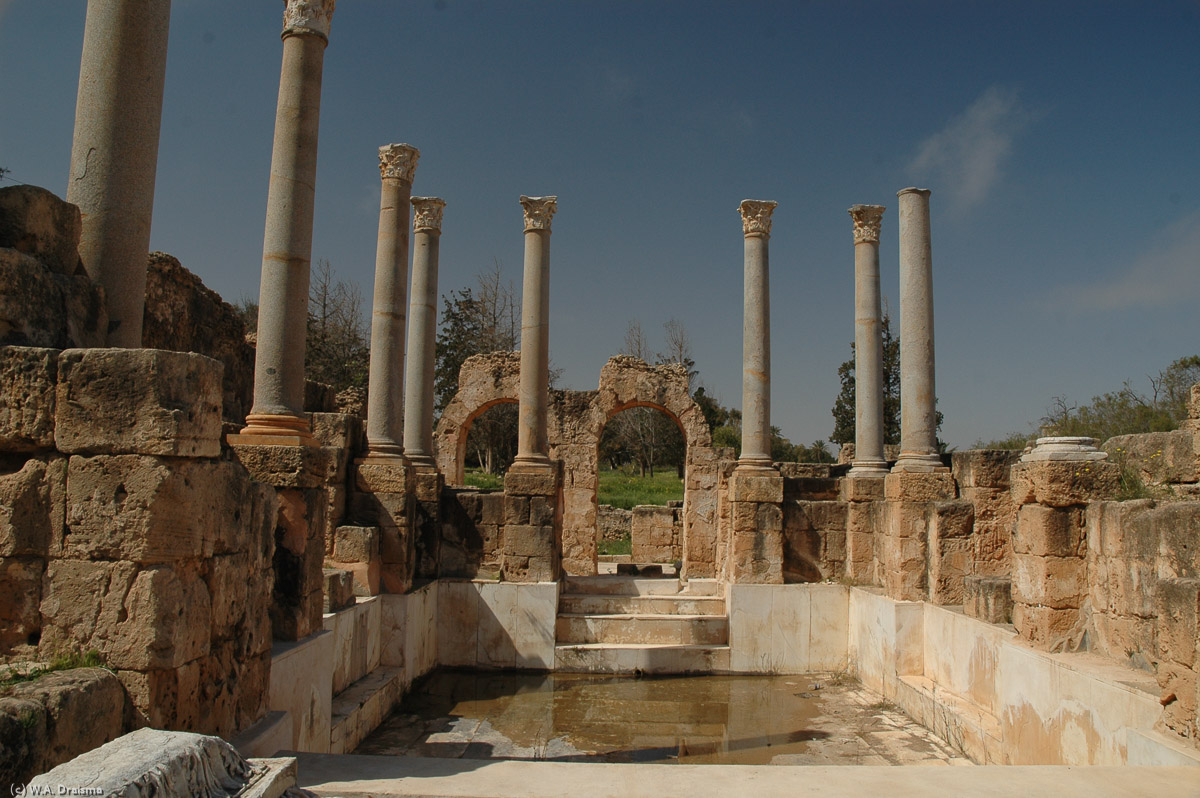 Following the arrival of permanent water and marble in Leptis Magna, emperor Hadrian commisioned the building of the superb Hadrianic Baths. Opened in AD 137, the baths soon became one of the social hubs in the city. The firigidarium, or cold room, measured 30 by 15 m and the vaulted roof was supported by eight massive cipolin columns. The room was paved with marble and there were pools at either side.