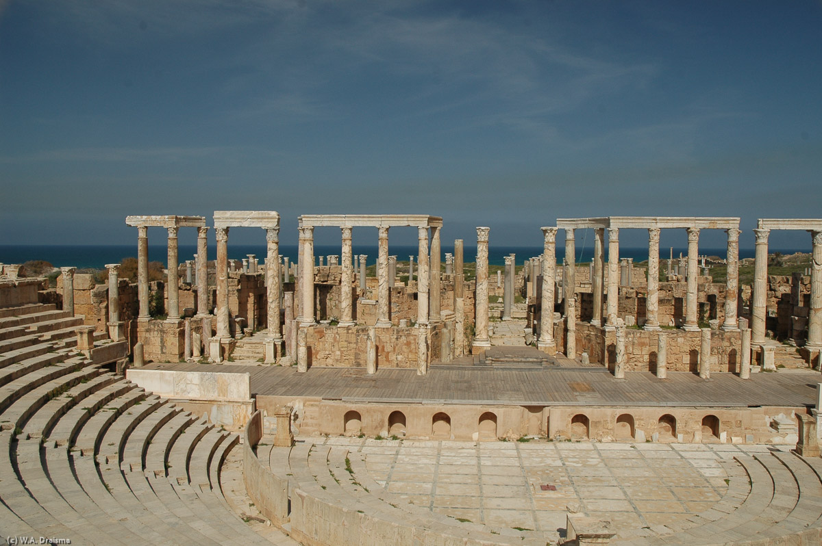 The theatre of Leptis Magna is the oldest stone theatre anywhere in the Roman world. It was built on the site of a 3rd - 5th-century BC Punic necropolis. Begun in AD 1-2 it is the second largest surviving theatre in Africa after Sabratha's.