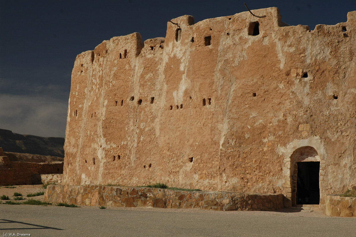 Although the name Qasr means castle, Qasr al-Haj was rarely used as a form of defence. Instead it was built as a place to store the harvests of the surrounding area in the second half of the 12th century by As-Sheikh Abd-'Allah ibn Mohammed ibn Hillal ibn Ganem Abu Jatla, or simply Sheikh Abu Jatla.