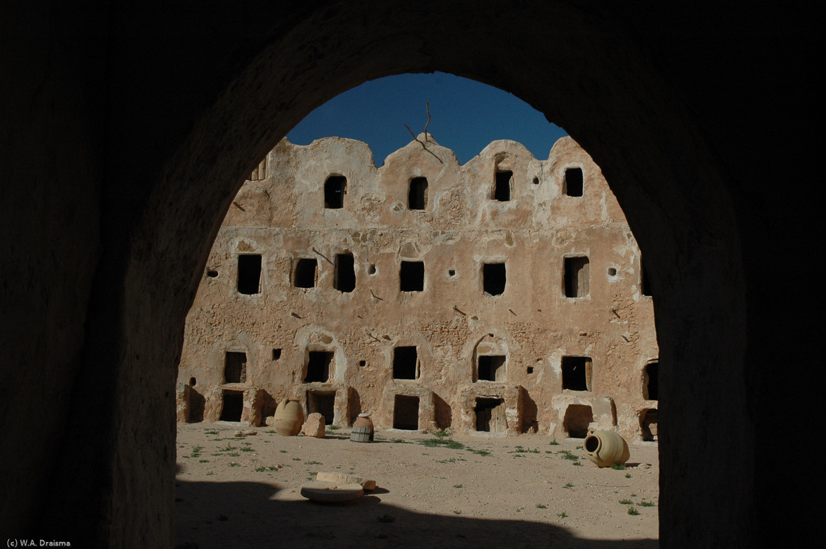 Entering Qasr al-Haj is like wandering into a man-made canyon. Constructed from local rock and gypsum, the structure counts 114 storage rooms, cool areas sealed with doors made from palm trunks. This warded of insects, thieves and bad weather. The purpose of the Qasr was comparable to a modern bank, saving goods for less favourable times.