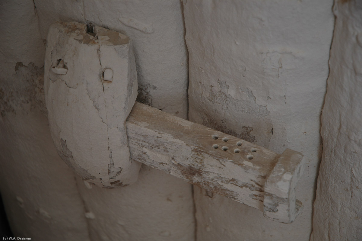 The wooden padlocks seen on several doors are an early form of our present day locks. They could only be opened with a key with pins in the right places.