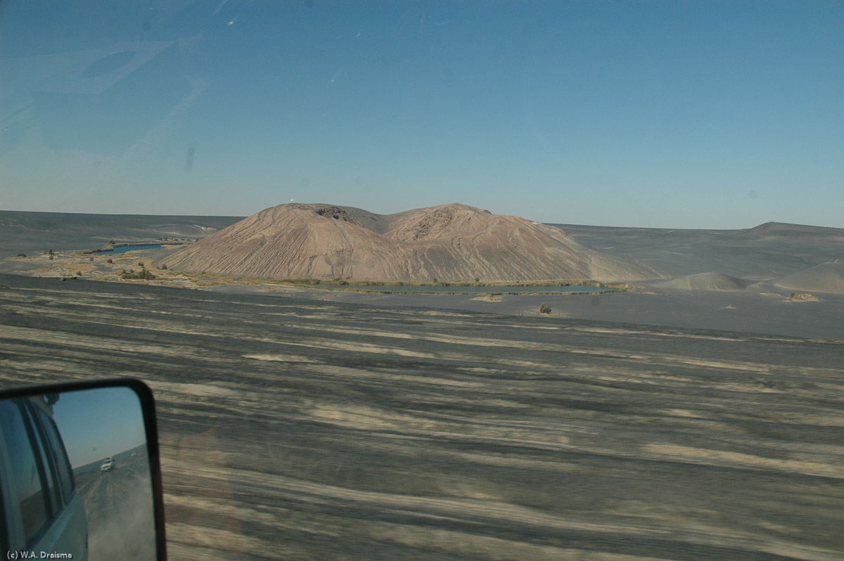 Around noon on the third day we reach Waw an Namus, one of the most remote places in the world, standing at the centre of the Sahara just under 300km from Tmissah.