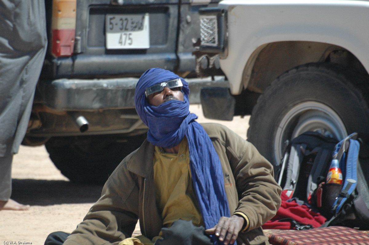 Even the most anxious of our drivers now casts a quick glance at the sun. A few seconds, not more. But we're glad that instead of lying under a car with his eyes shut, he'll whitness this remarkable phenomenon, probably for only once during his lifetime.