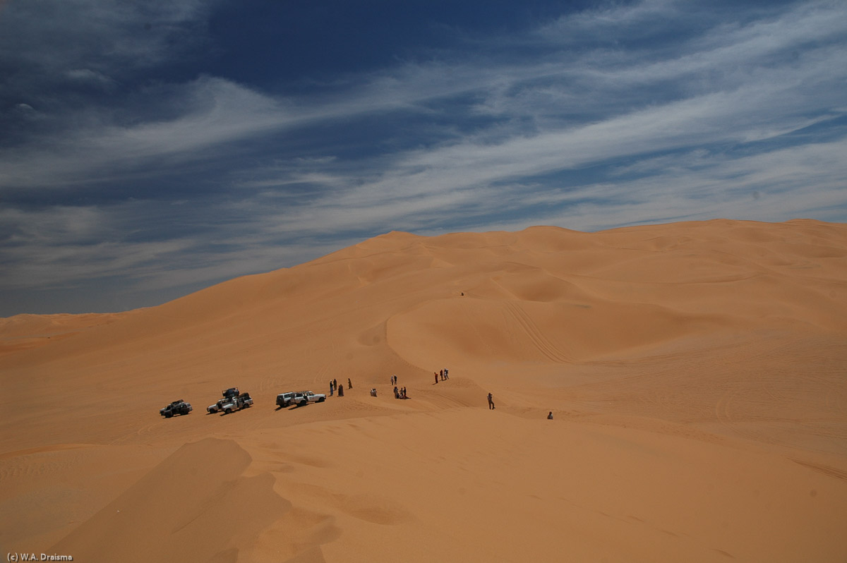 The Idehan Ubari, or Ubari sand sea, is one of the highlights of a trip to Libya because of the presence of a number of idyllic palm-fringed lakes set in a spectacular scenery of high dunes. We enter the Idehan Ubari at Tekerkiba, the gateway to the Idehan Ubari.