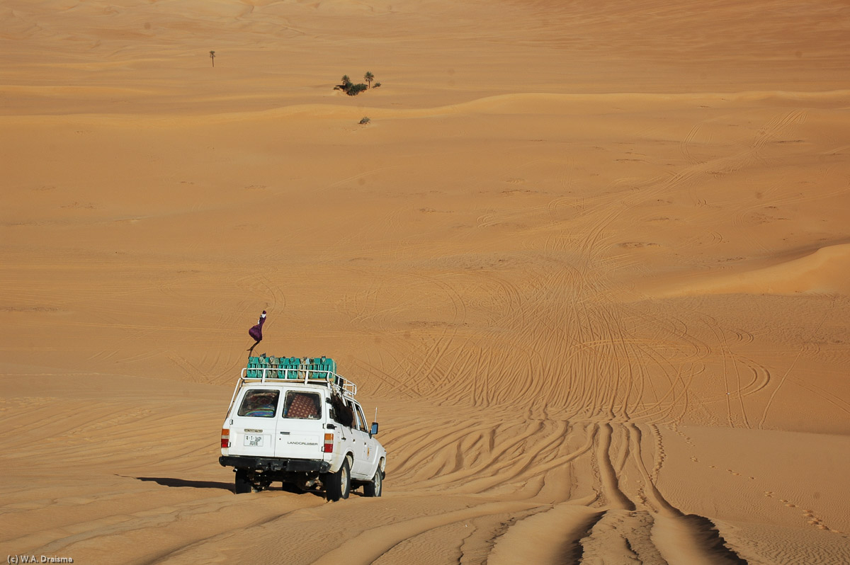 The lakes of Um al-Maa and Mandara are reached via a hair raising descent over very high dunes. Mandara once was one of the most stuning of the lakes. Following an alarming drop in its water level much of the lake is now devoid of water for most of the year.