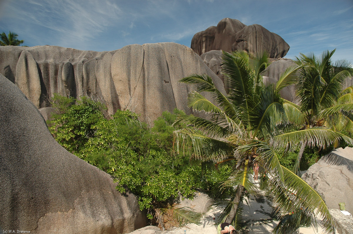 The boulders are higher than the coconut palms creating several secluded small beaches.