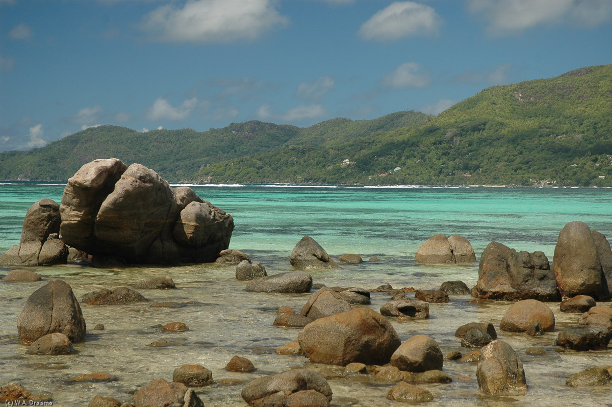 Although less impressive than on La Digue, granite rocks litter the beach on Mahé as well.
