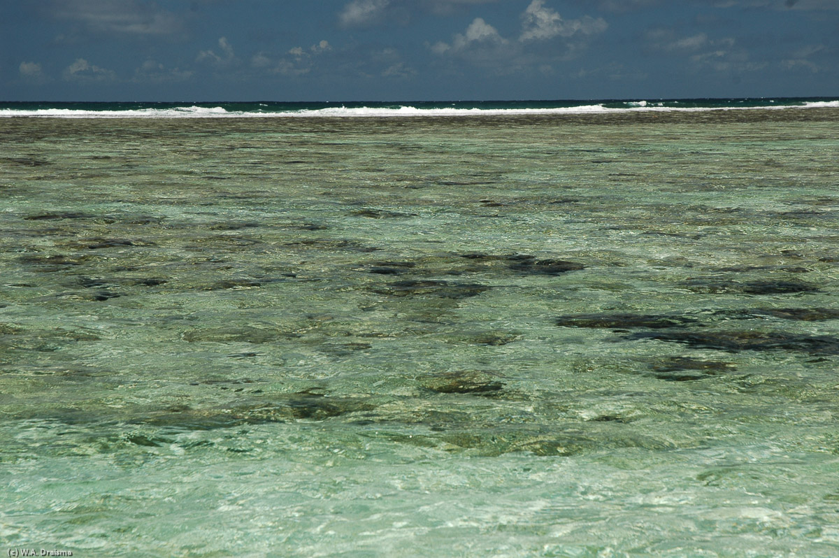 The crystal clear waters of the various lagoons are separated from the deep ocean by coral reefs.