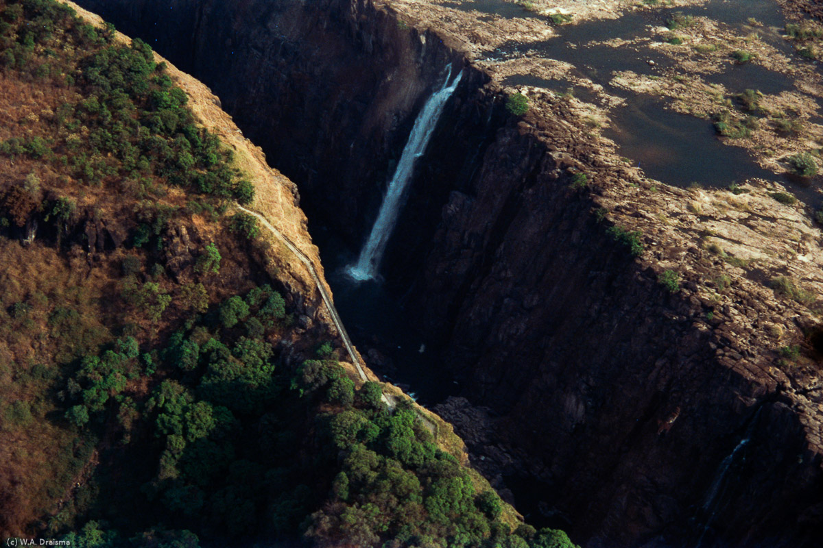 In September, halfway the dry season, the eastern side of the falls has fallen dry.