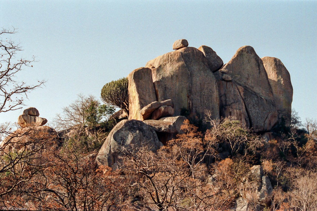 Created by softer rocks being eroded away over millions of years, the remaining granite kopjes have been used as natural shelters since prehistoric times. The area is littered with caves and prehistoric rock paintings.
